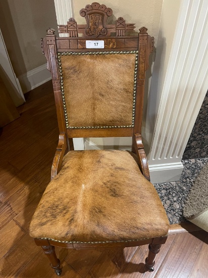 Oak  Eastlake Reupholstered Cowhide Chair with Nail head  Trim. Front Legs are on Casters
