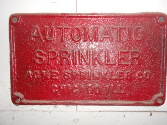 Acme Sprinkler plate, Chicago sign