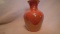 Iridescent orange vase, 6.25”H x 4.5”W