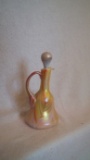 Yellow, orange, red swirl pattern cruet with stopper, marked Gibson 1984, 7:H x 3.5”W