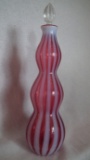 Cranberry opalescent wine bottle