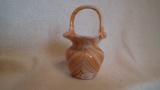 Orange & white handled basket, marked Gibson 1984, 4 5/8”H x 3 1/8”W