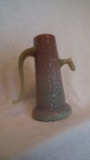 Pink & green pump vase with raised design, marked Wood (where the W is a butterfly), 6.25”H x 5”W