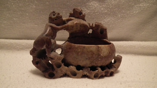Soapstone vase, monkey w/ plant, marked China on back, 3.25”x4.5”