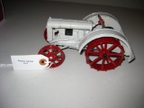 silver tractor w/red wheels