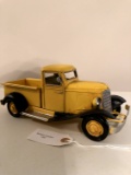 Yellow Toy antique pickup truck