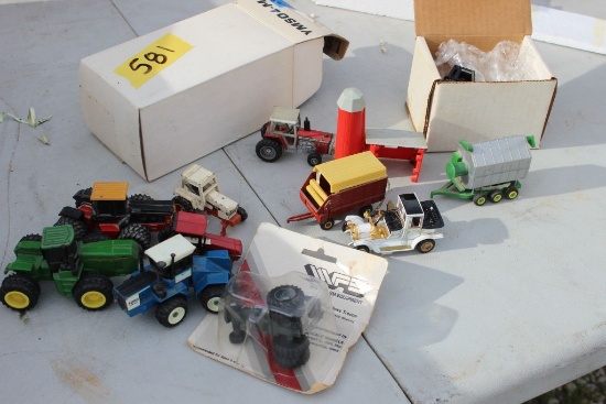 Lot of 12 1:64 scale tractors & accessories