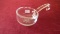 Clear serving piece with curved end on handle, etched star in bowl & etched vertical line design in