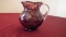 Fenton, plum coin spot creamer with clear handle, unmarked, 4” x 4 1/4”