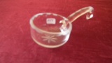 Clear serving piece with curved end on handle, etched star in bowl & etched vertical line design in