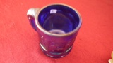 Imperial, blue carnival cup with elephant handle & nursery rhyme panels on the sides, 3” x 4”