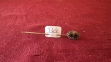 Hat/Lapel pin, black background with gold, black rhinestones, 2 ½” long