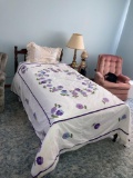 Twin bed with bedding