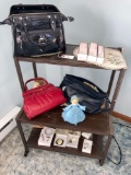Tv stand, costume jewelry, lady?s purses, Mary Kay, misc.