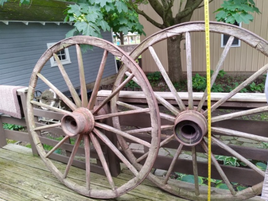 Two 55 Inch Wooden Wagon Wheels
