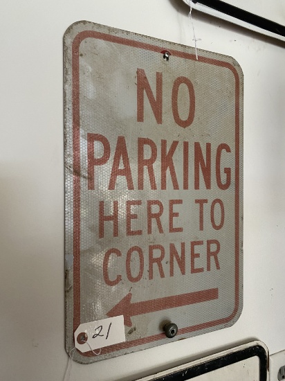 No Parking here to  corner sign