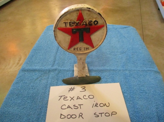 Texaco cast iron door stop