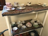 Large lot of Teacups and Rag rugs on Shelf