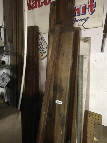 Wood and scrap metal on wall lot