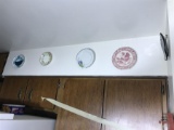 Plates around the top of the kitchen lot