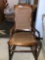 Antique Cane Bottom Rocking Chair Carved