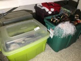 Four Totes of Christmas Items Under Table