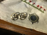 Items on cabinet including Watch & US Insignia