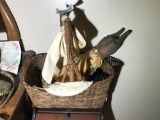 Old Basket with strange stuffed toy rabbit