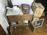 Items on top of and next to wooden cabinet