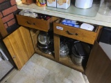 Contents of two drawers and cabinet in kitchen