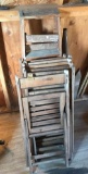 Stack of Wooden Folding Chairs, Ladder