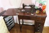 Antique Montgomery Ward Sewing Machine in table