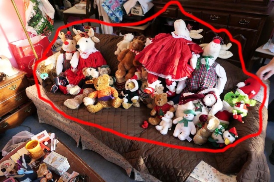 Couch lot of assorted teddy bears etc