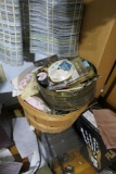 Basket full of old buttons, sewing supplies