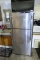 Stainless Steel Refrigerator in Garage Frigidaire
