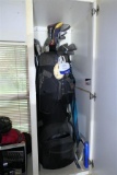 Set of Golf Clubs and more in cabinet