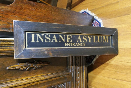 Insane Asylum Glass Framed Sign