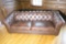 Large leather style Chesterfield couch or sofa