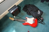 Squire mini Fender guitar, amp, bag