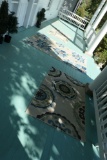 Group of three outdoor porch mats or carpets