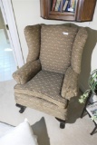 Earlier wing back chair w/paw feet