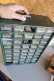 Sorter Bin filled with Old Premiums, Tiny items