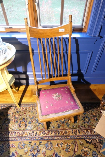Antique upholstered oak rocking chair