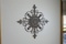 Metal fleur de lis wall decor piece