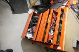 Contents of metal tool box and items on top