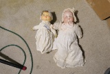 2 Antique Porcelain Dolls in clothing