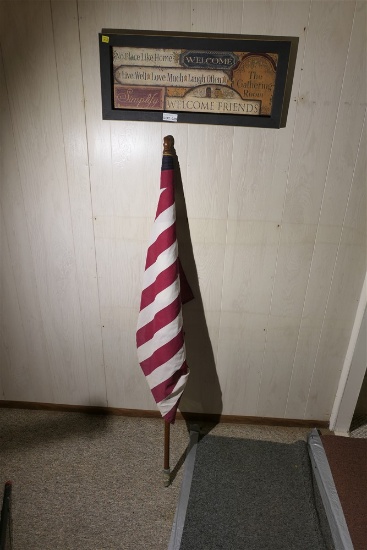 House flag and decorative framed piece