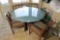 Glass topped table and 5 chairs PLUS