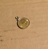 Gold 1/10 Krugerrand Coin in gold bezel
