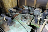 Corner lot of sewing machines, parts, tables etc